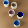 tazas expresso artesanales distintas formas color lila azul intenso
